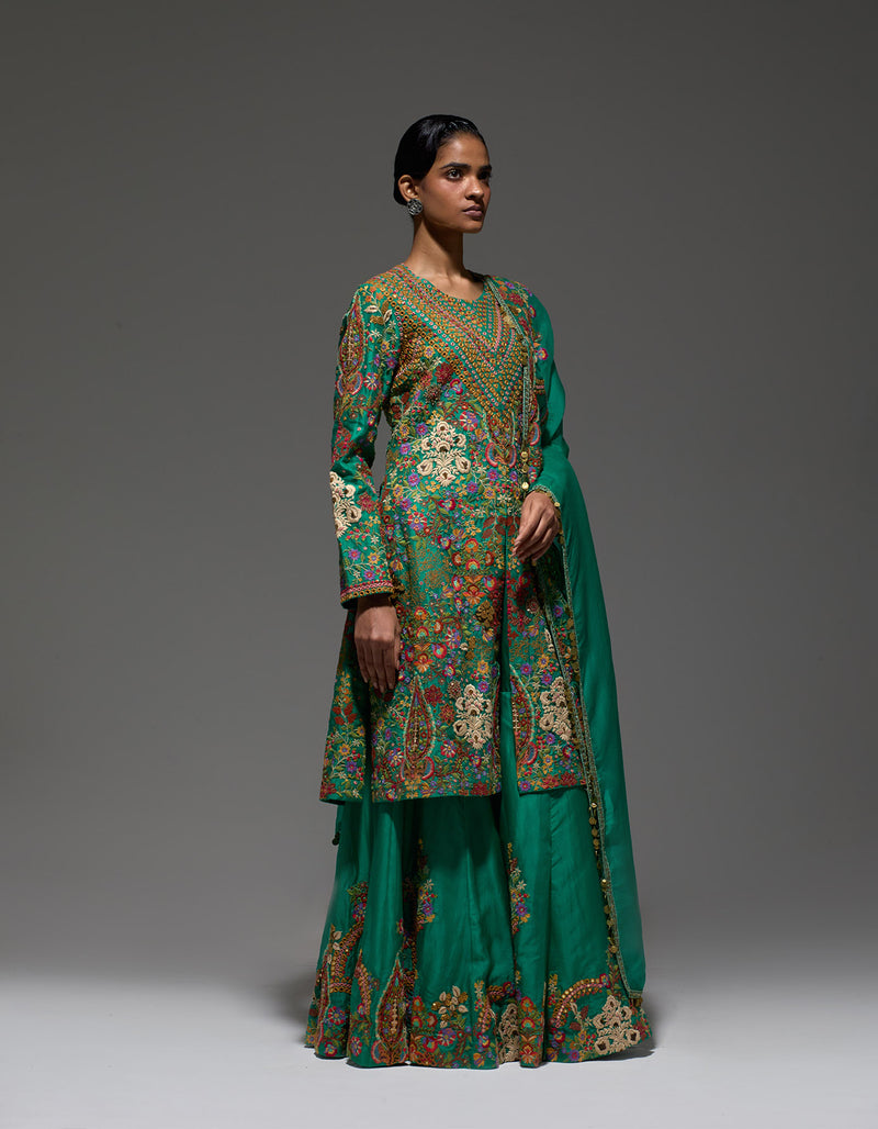 Green Heavy Paisly Emb. Sharara With Organza Polash Short Jactet Wit Dupatta